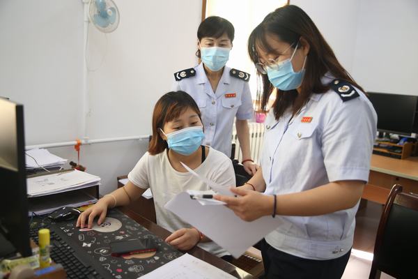 銅川市王益區稅務分局相關人員深入陜煤建設銅煤公司進行業務調研指導